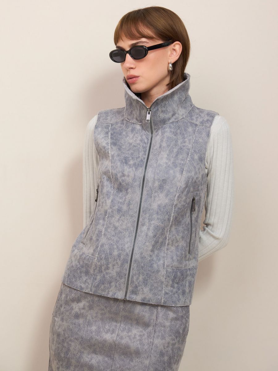 ווסט עור פרווה דמוי עור