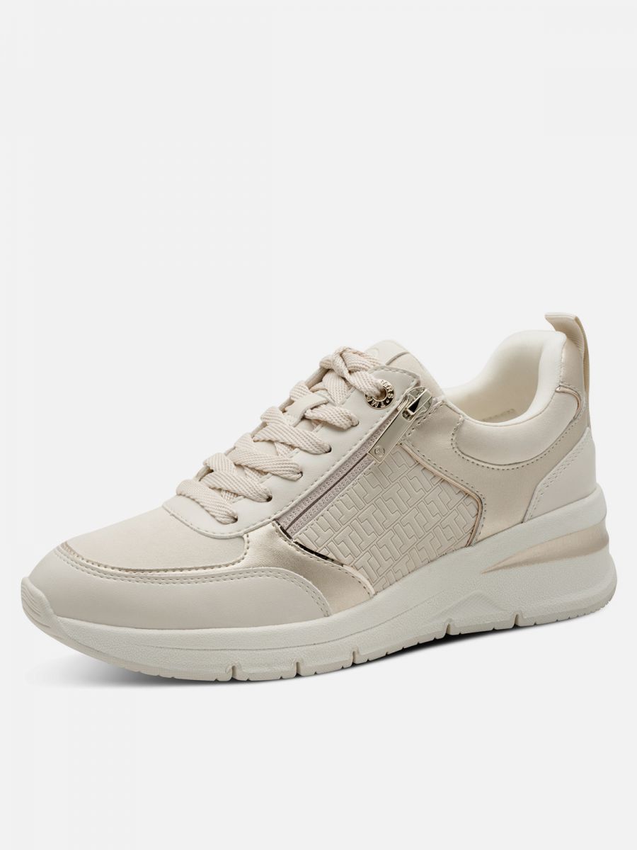 סניקרס צבע שנהב עיטור זהב עם רוכסן סוליה מוגבהת. תמריס TAMARIS.