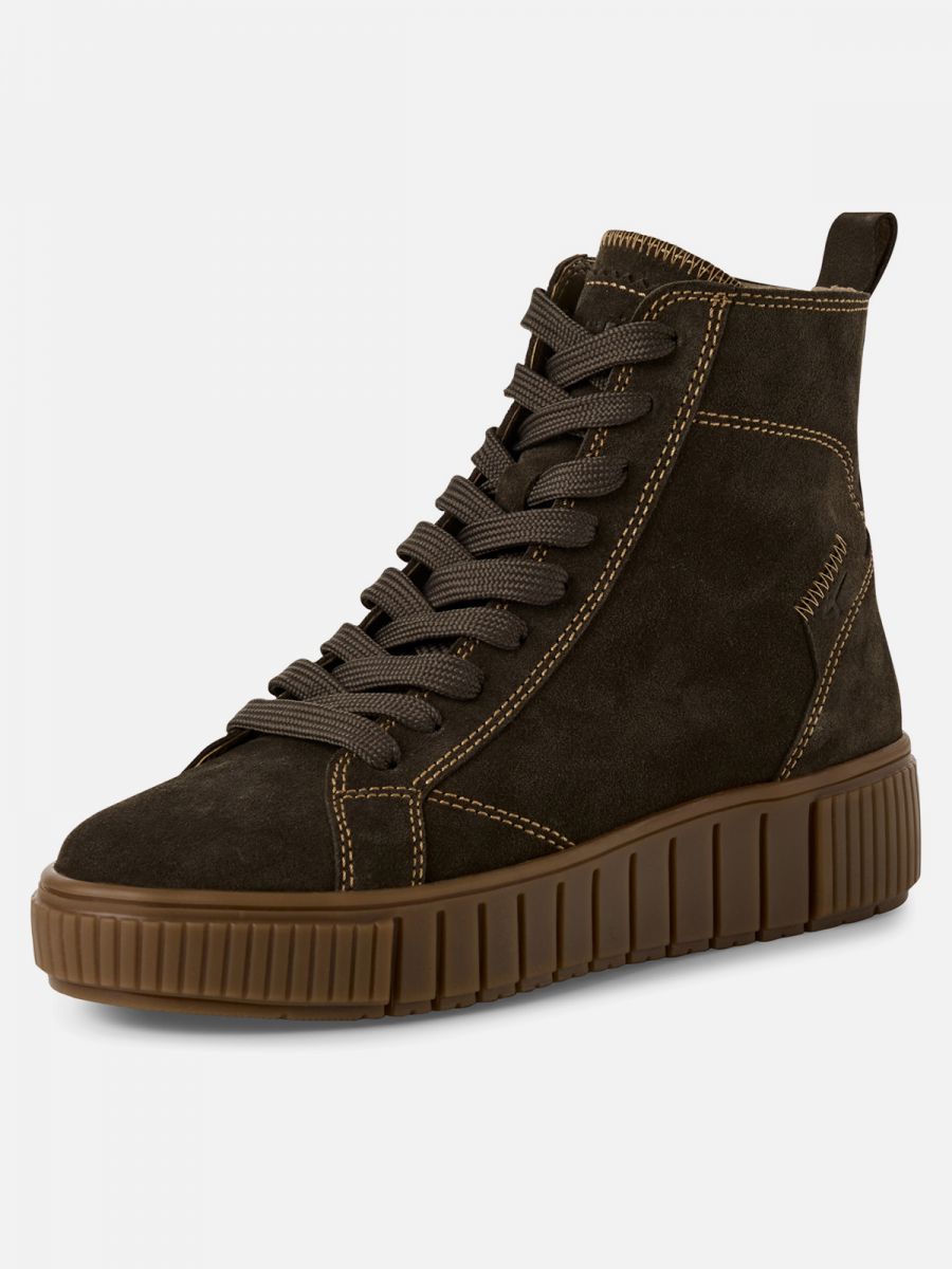 מגפון עור אופנתי בצבע בז’ אופנתי עם תיפורים מעוצבים. סוליה רחבה ומדרס נשלף. תמריס TAMAIS