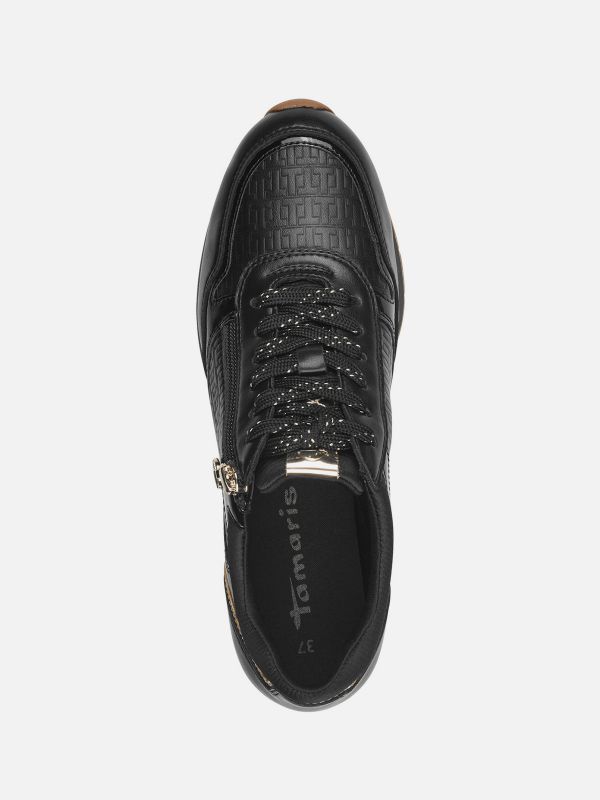 סניקרס שחור בעיטור זהב עם רוכסן סוליה שטוחה. תמריס TAMARIS.